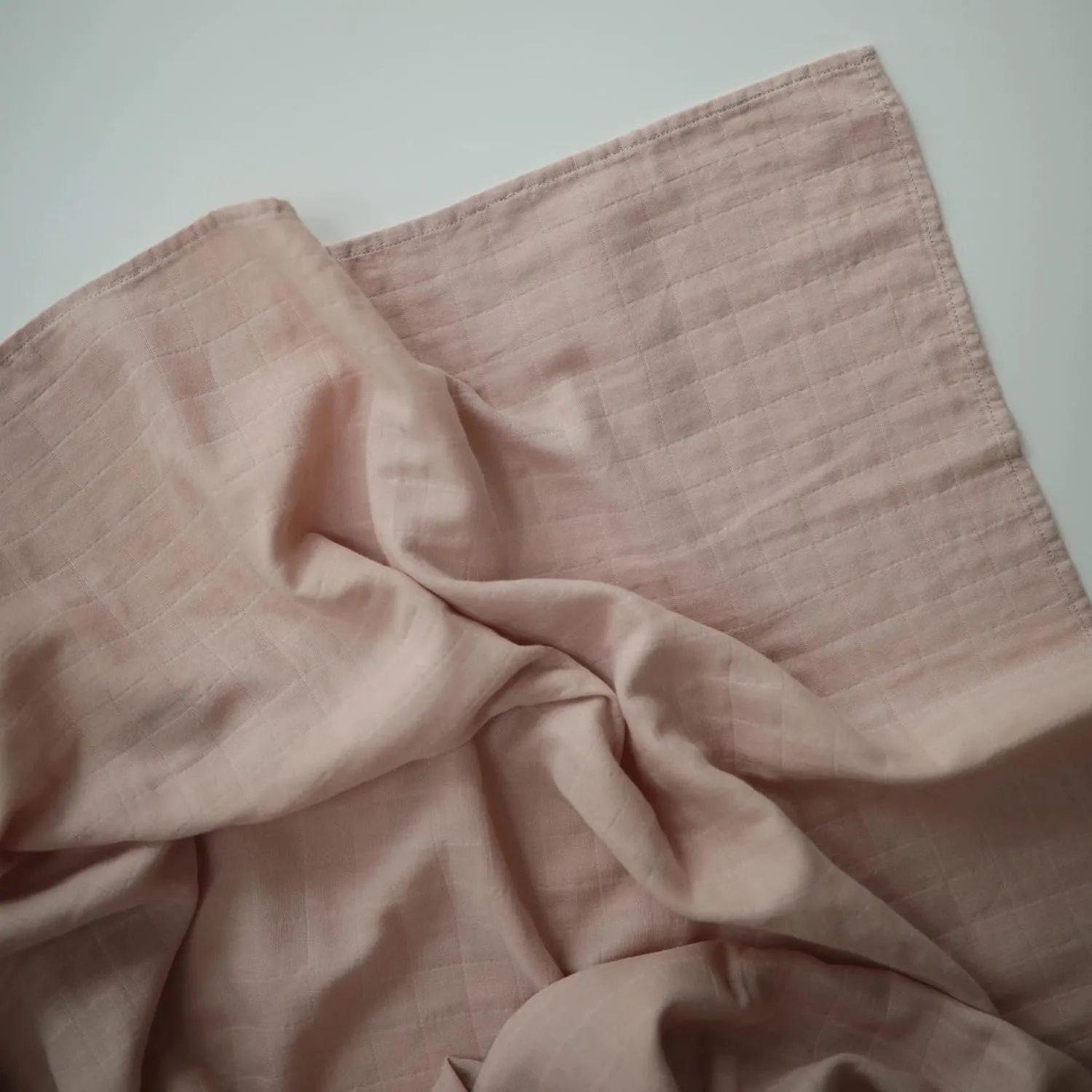 mushie Muslin Baby Swaddle Blanket | 100% Organic Cotton (Blush)